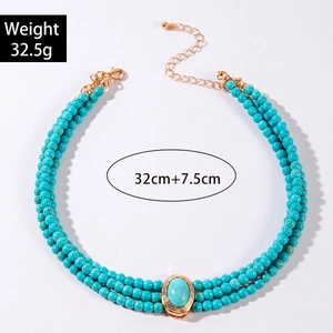 Detailed view of bohemian turquoise triple-layer necklace with size and weight info