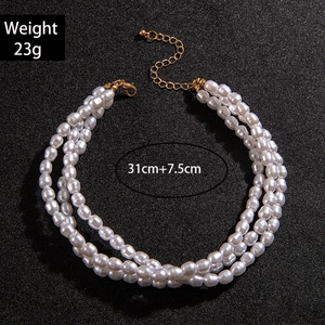 Detailed view of triple-layer pearl necklace with size 31cm+7.5cm and 23g weight