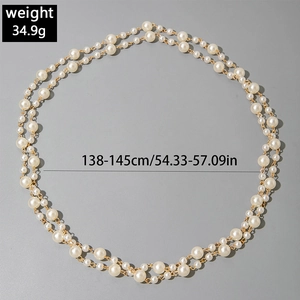 Detail of layered faux pearl necklace showing 138-145cm length and 34.9g weight