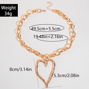 Detail of chunky gold chain necklace with hammered heart pendant and dimensions