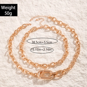 Detailed view of layered chunky gold aluminum chains with oval clasp weight 50g