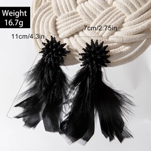 Elegant long black feather tassel earrings with beaded star top and 4.3 inch length