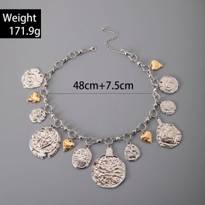 Detail of chunky multi-layered aluminum chain necklace with charms and weight measurements