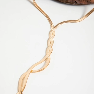 Detail of a multi-layer golden herringbone chain with a twisted spiral structure