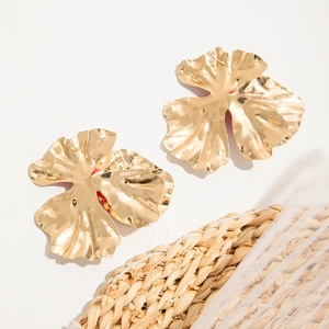 Golden oversized petal earrings with textured metal finish and 3D floral design