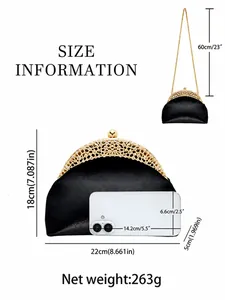 Black suede semi-circle evening clutch with rhinestone floral frame and chain strap