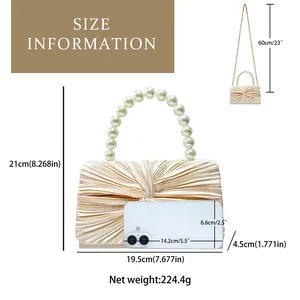 Detailed size chart for pleated evening bag showing 19.5cm width and pearl handle