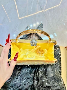 Elegant gold evening clutch bag with sparkling rhinestones and metal handle for women