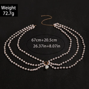 Détails de la chaîne de taille multicouche en perles avec pendentif baroque sur fond noir