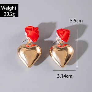 Detail view of red silk rose earrings with heart pendant showing 5.5cm size measurement