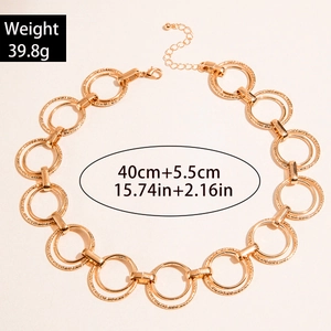 Close-up of double layered gold circle necklace featuring lobster clasp and extension chain