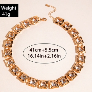 Detail view of 41g gold double-layer square link necklace with clear crystal settings