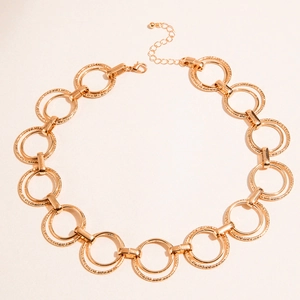 Double-layered gold-tone circle necklace with interlocking rings and textured finish