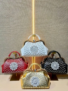 Luxurious rhinestone evening handbags in white, red, black and gold colors