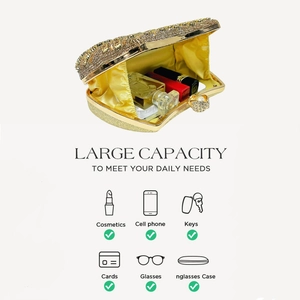 Interior view of gold rhinestone clutch showing space for phone and cosmetics