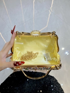 Luxurious evening clutch bag with sparkling rhinestones and golden chain strap