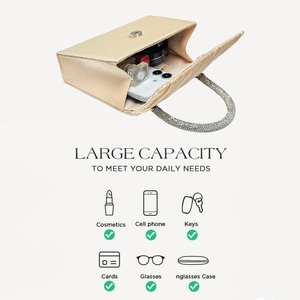 Top view of champagne satin evening bag showing large capacity for essentials