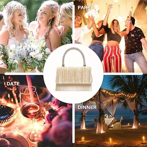 Detail of pleated champagne evening bag with rhinestone ring handle for wedding and parties