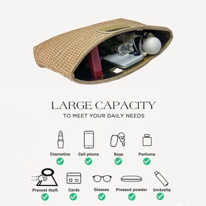 Macro view of straw clutch interior showing large capacity for essentials like phones