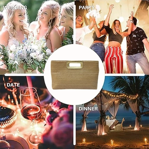Detail of straw woven clutch with gold metal handle for wedding and party events