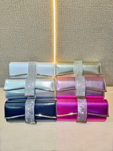 Detailed display of rhinestone evening clutch bags in six vibrant metallic colors