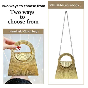 Detail of golden snake texture handbag showing dual handheld and crossbody carrying options