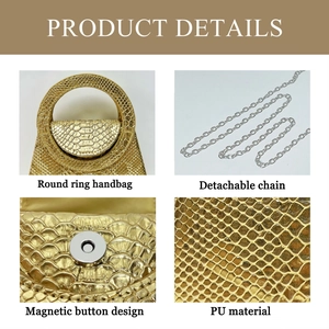 Detailed view of gold snake-pattern handbag with metal ring handle and chain