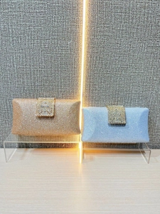 Elegant glitter clutch bags in champagne and light blue with crystal buckle decoration