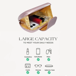 Capacité interne de la pochette de soirée rose montrant le rangement du maquillage