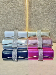 Elegant evening clutch bags in six metallic colors with rhinestone accents and textures