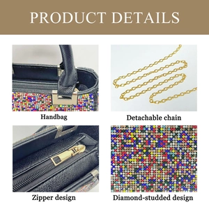 Detail of colorful rhinestone evening bag with gold chain and zipper closure