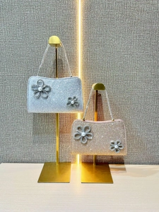 Elegant glitter evening clutch bags with pearl flowers in silver and champagne gold