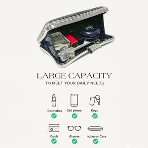 Detailed interior of silver rhinestone evening clutch bag showing large storage capacity