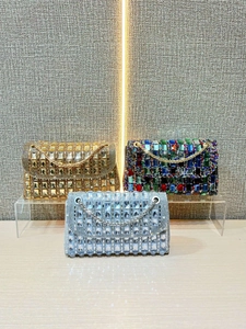Elegant rhinestone evening clutch bags with chain straps in gold, silver, and multicolor