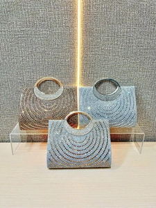 Sparkling rhinestone evening handbags with round metal handles in gold, silver, and blue