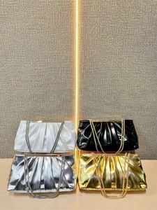Ruched clutch evening bags with metal chains in white, black, silver, and gold colors