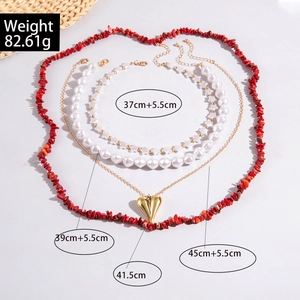 Bohemian layered necklace set with heart pendant, faux pearls and star charms