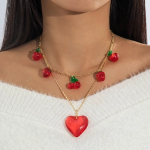 Minimalist gold double layer necklace with red acrylic hearts and cherry pendants