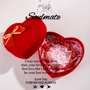 Red acrylic heart pendant necklace in a velvet gift box with soulmate card