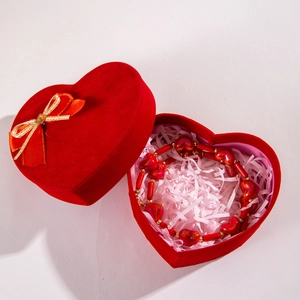 Red acrylic heart beaded necklace in a romantic gift box with festive packaging details