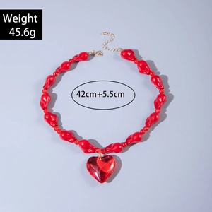 Detail view of red heart pendant necklace showing 45.6g weight and adjustable 42cm chain