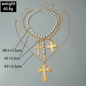Detail showing weight and size measurements for multi-layer cross and pearl necklaces