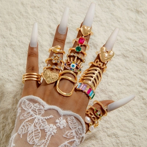 Lot de 17 bagues bohèmes dorées avec perles, cœurs et motifs mauvais œil