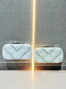 Elegant women's evening clutch bags with pearls, sequins and metal handles for parties