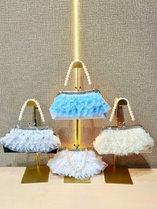 Elegant lace ruffled evening bags with pearl handles and rhinestone accents in four colors