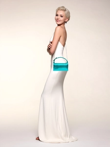 Elegant teal satin evening bag shown with fine silver chain strap and fixed short handle