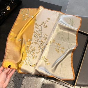 Vintage silk neckerchief for women with elegant floral and bird patterns in ginger yellow
