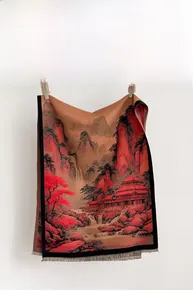 Detail of winter cashmere-like shawl with vintage Chinese landscape art in red and bronze