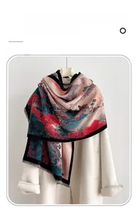 Detail of imitation cashmere scarf with mountain print and elegant fringe tassels