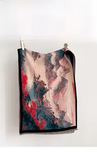 Detail of digital printed landscape pattern on cashmere-feel scarf with fringes